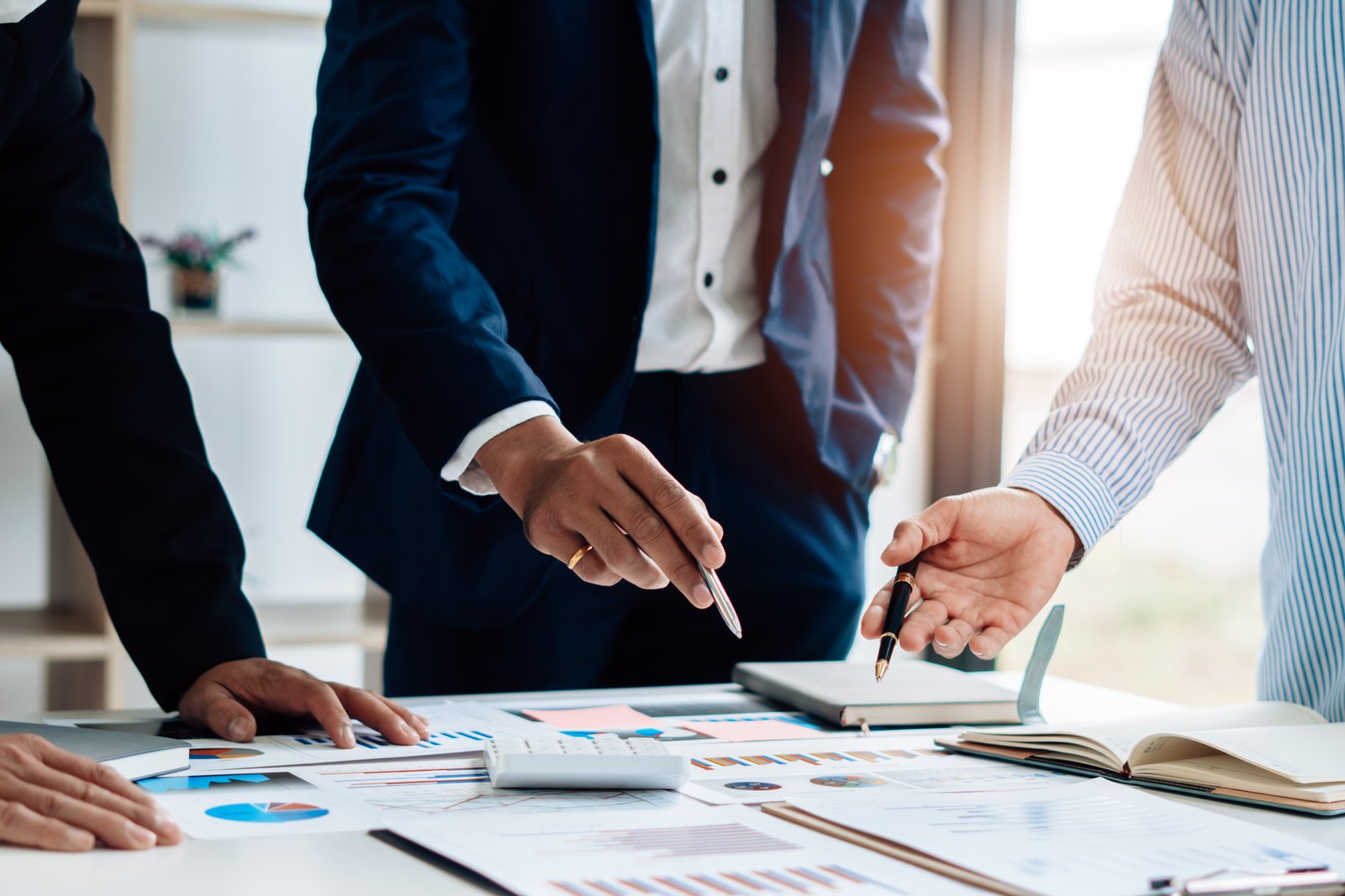 Business professionals meeting to discuss financial strategies