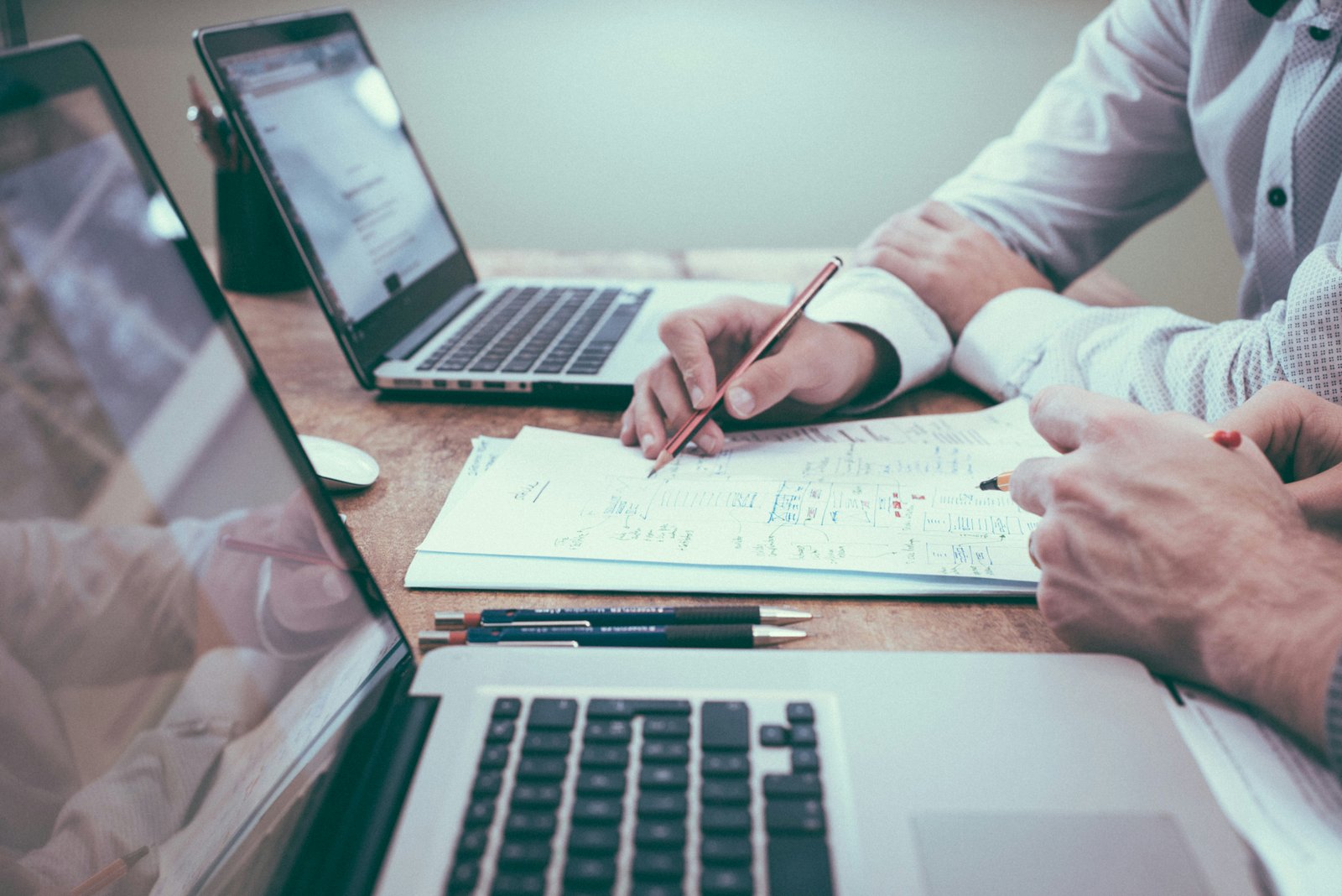 Business owner reviewing corporate plan documents
