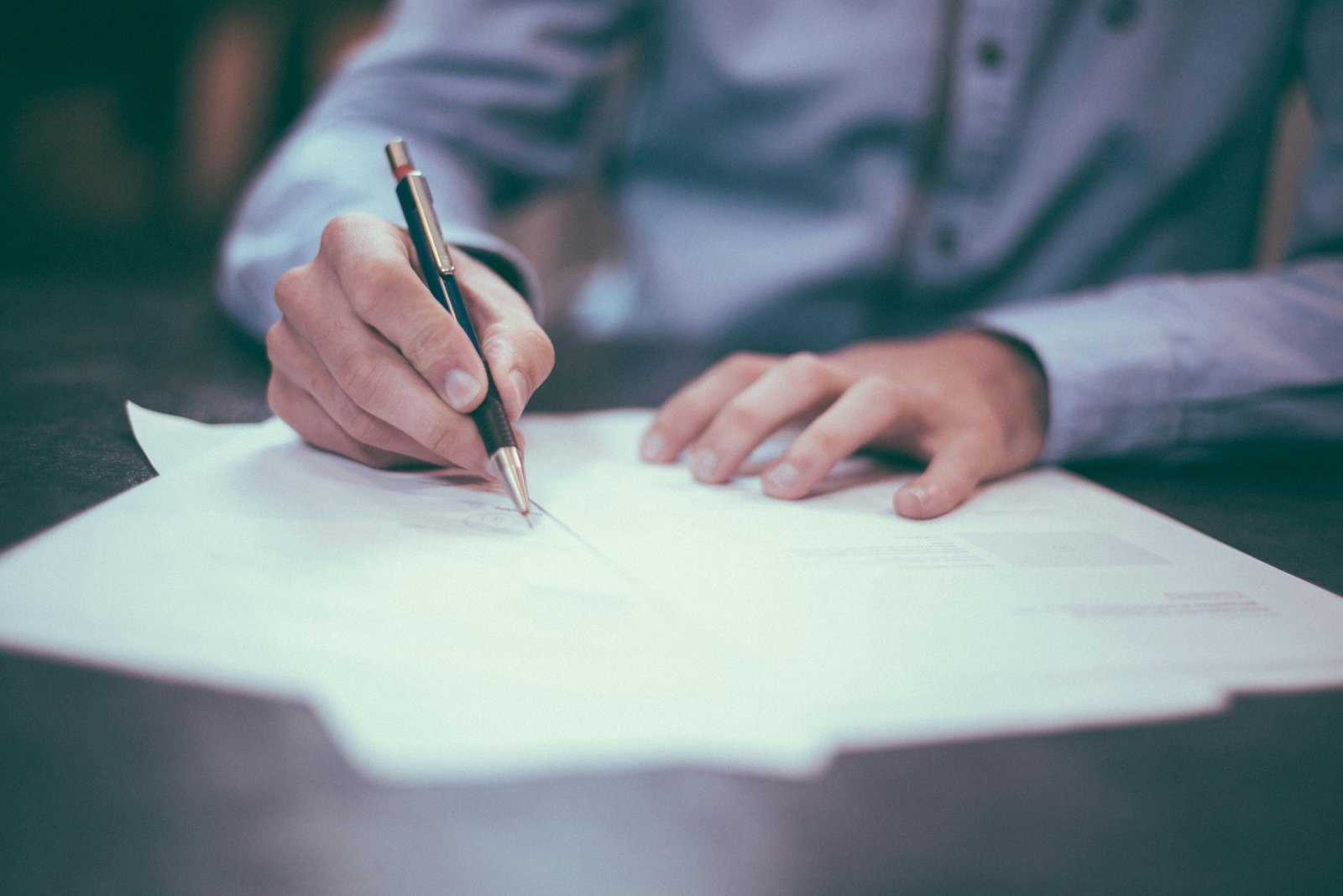 Business professionals reviewing strategy documents